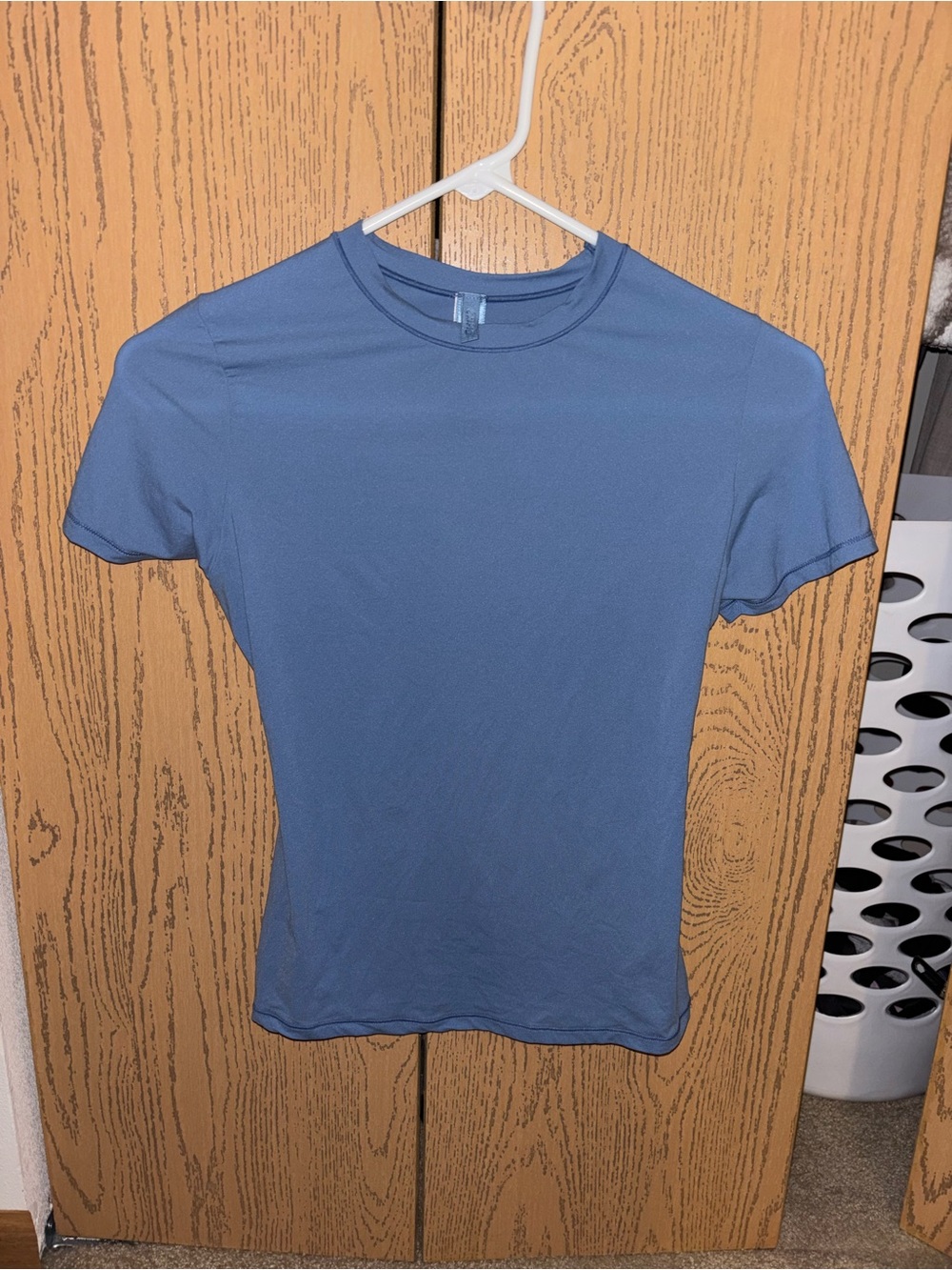 SKIMS blue tee shirt